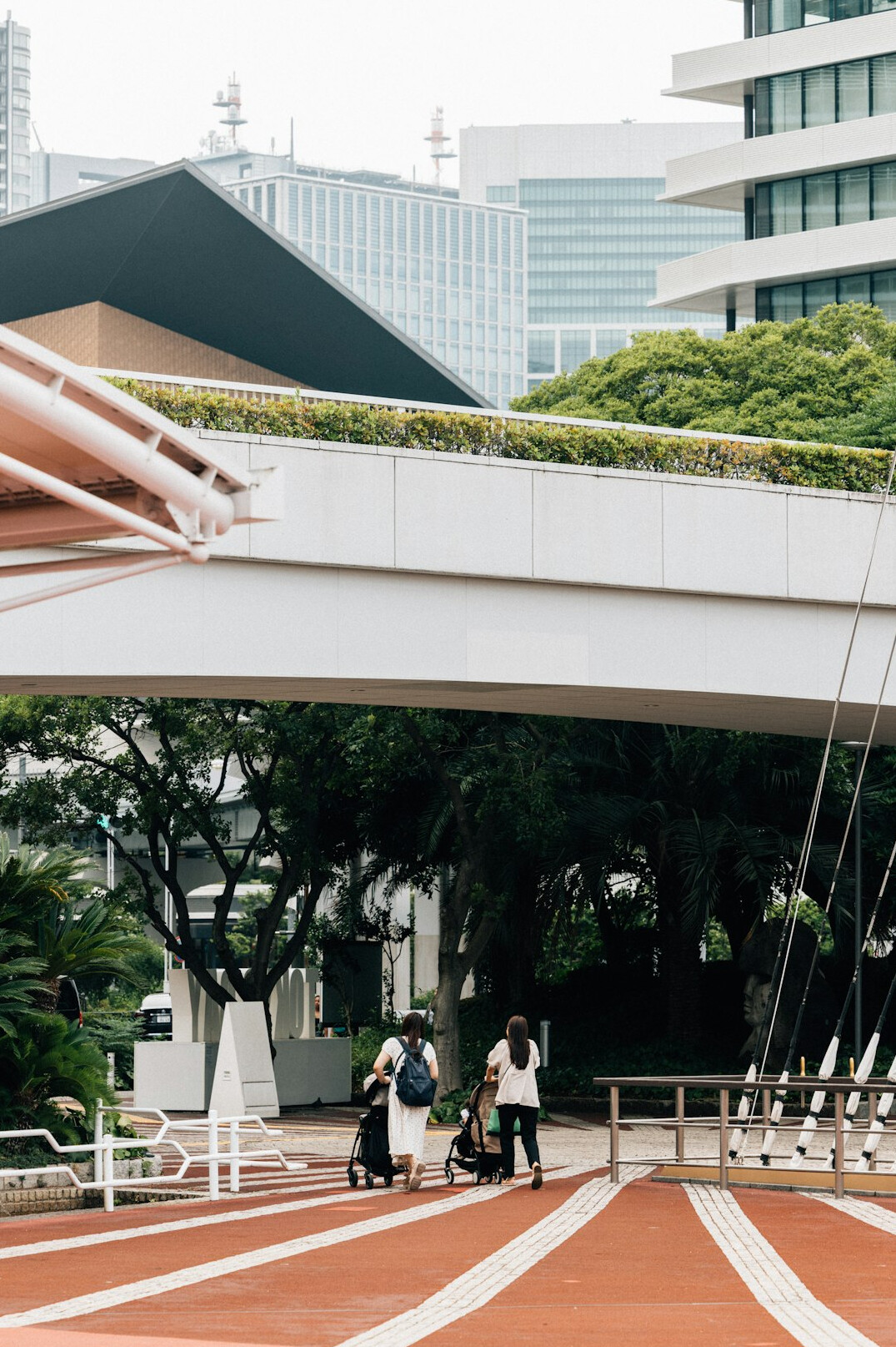 Diverse team of Singaporean software professionals collaborating around a laptop